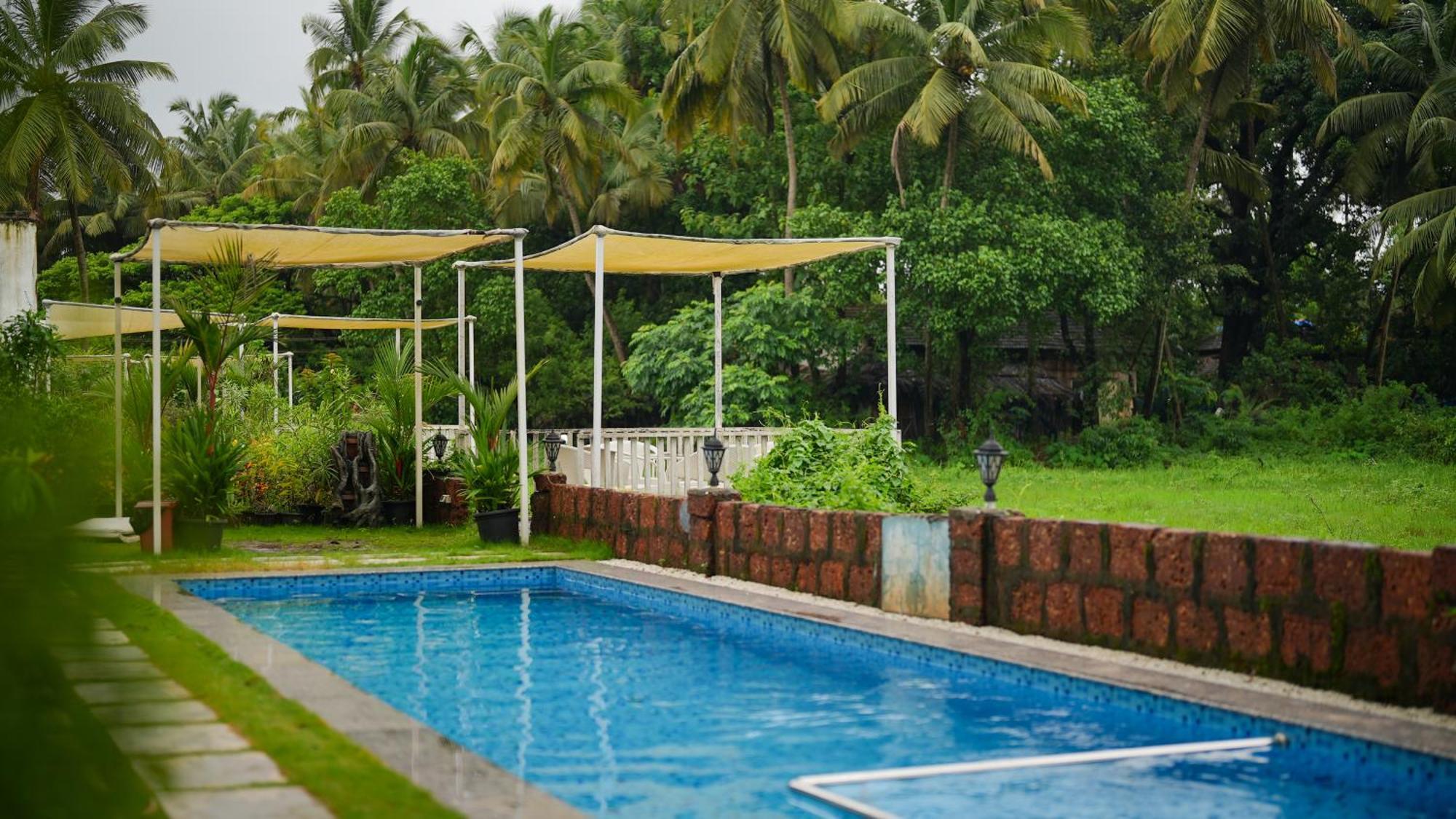 Whiteflower Resort Morjim Exterior foto